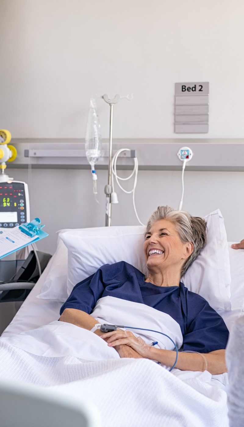 Doctor visiting senior patient with family