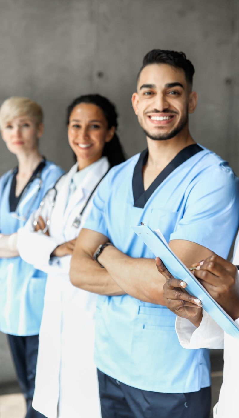 International team of doctors having morning breefing